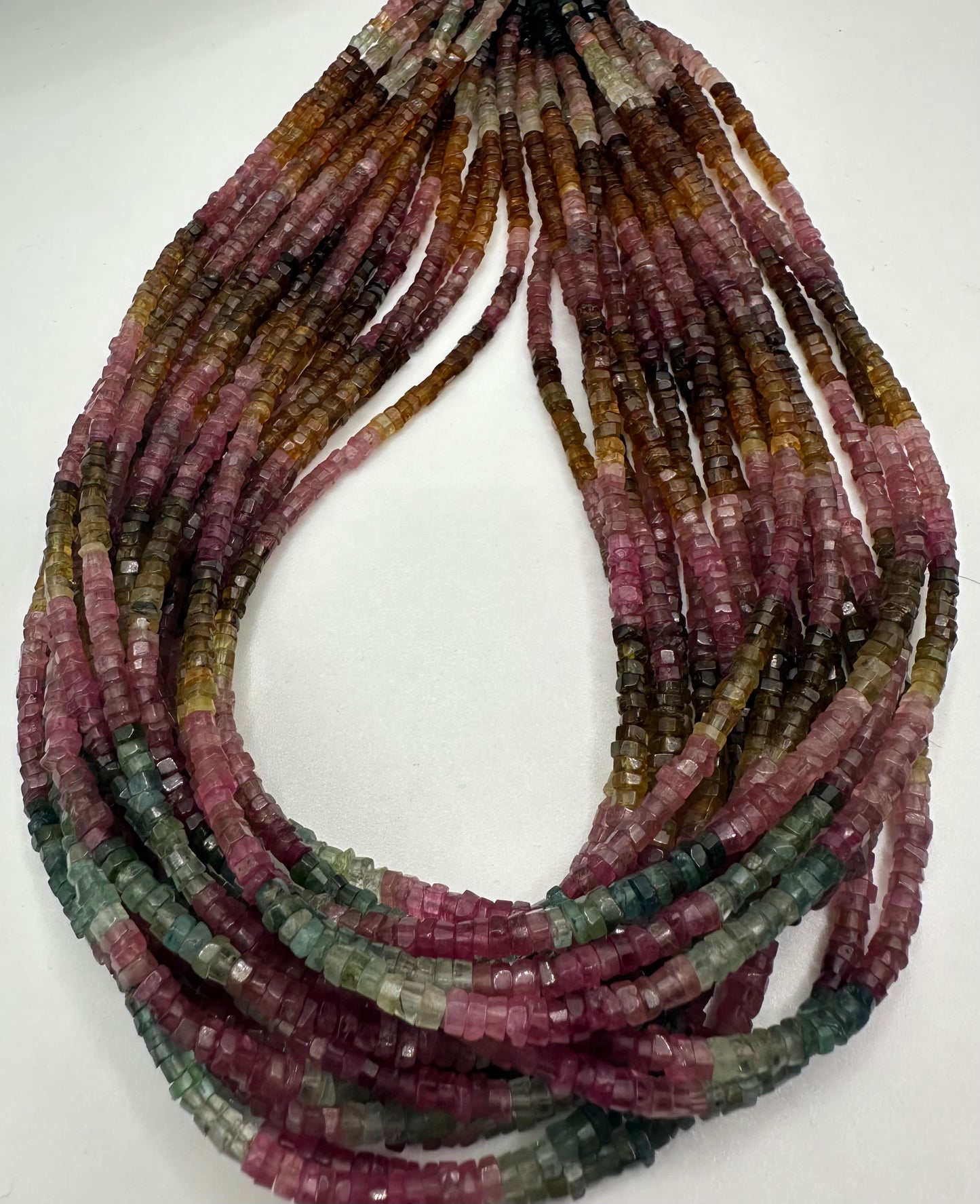 Tourmaline facetted roundel tyer