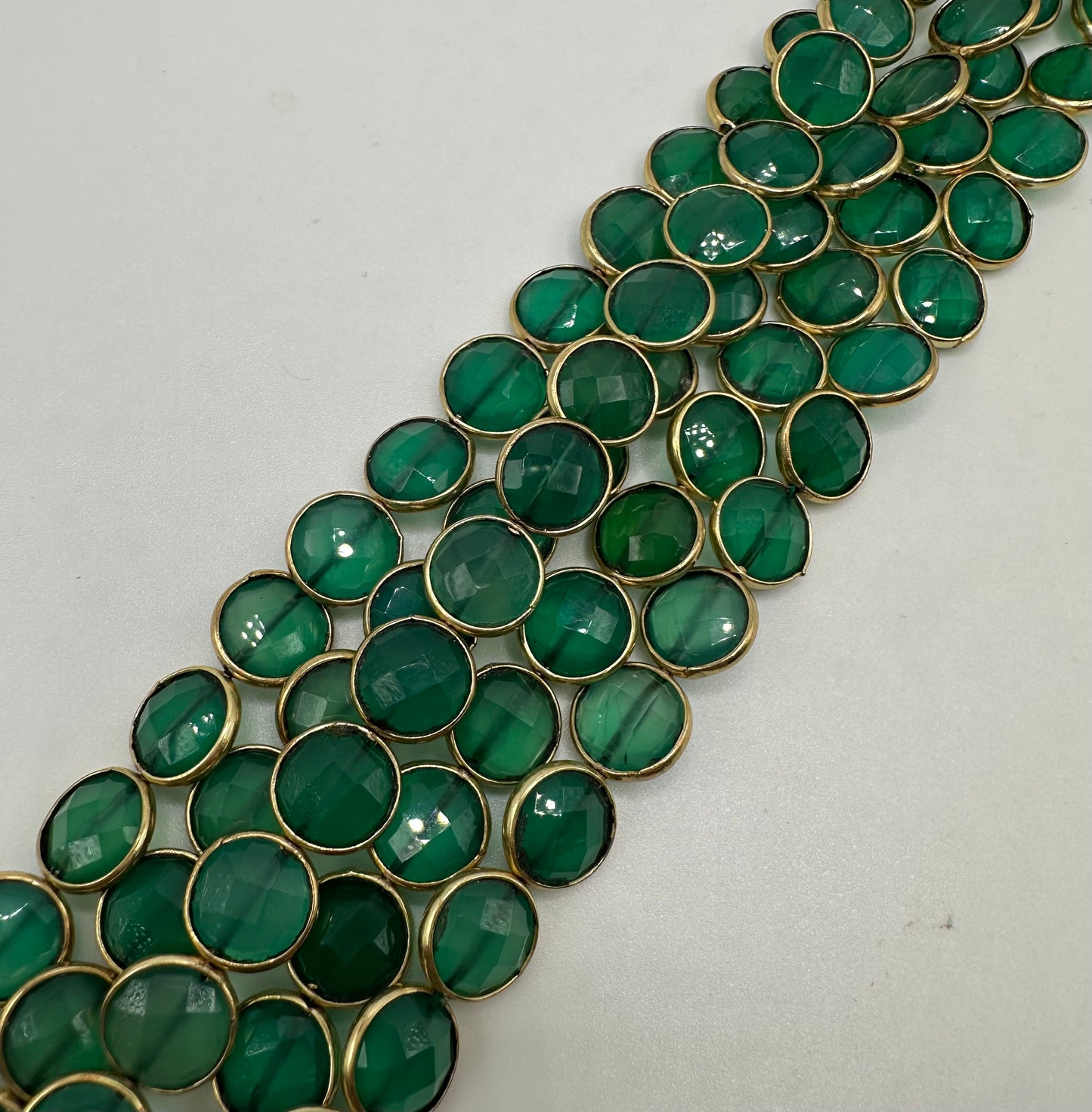 Green onyx facetted coin