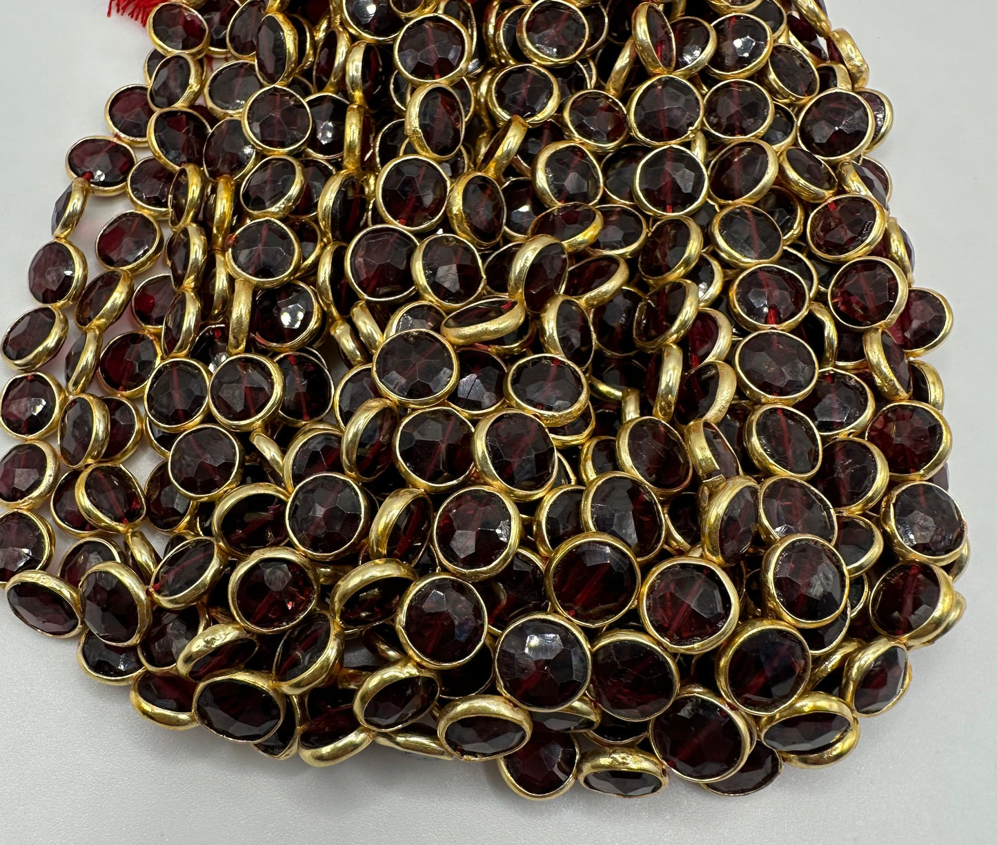 Garnet facetted coin