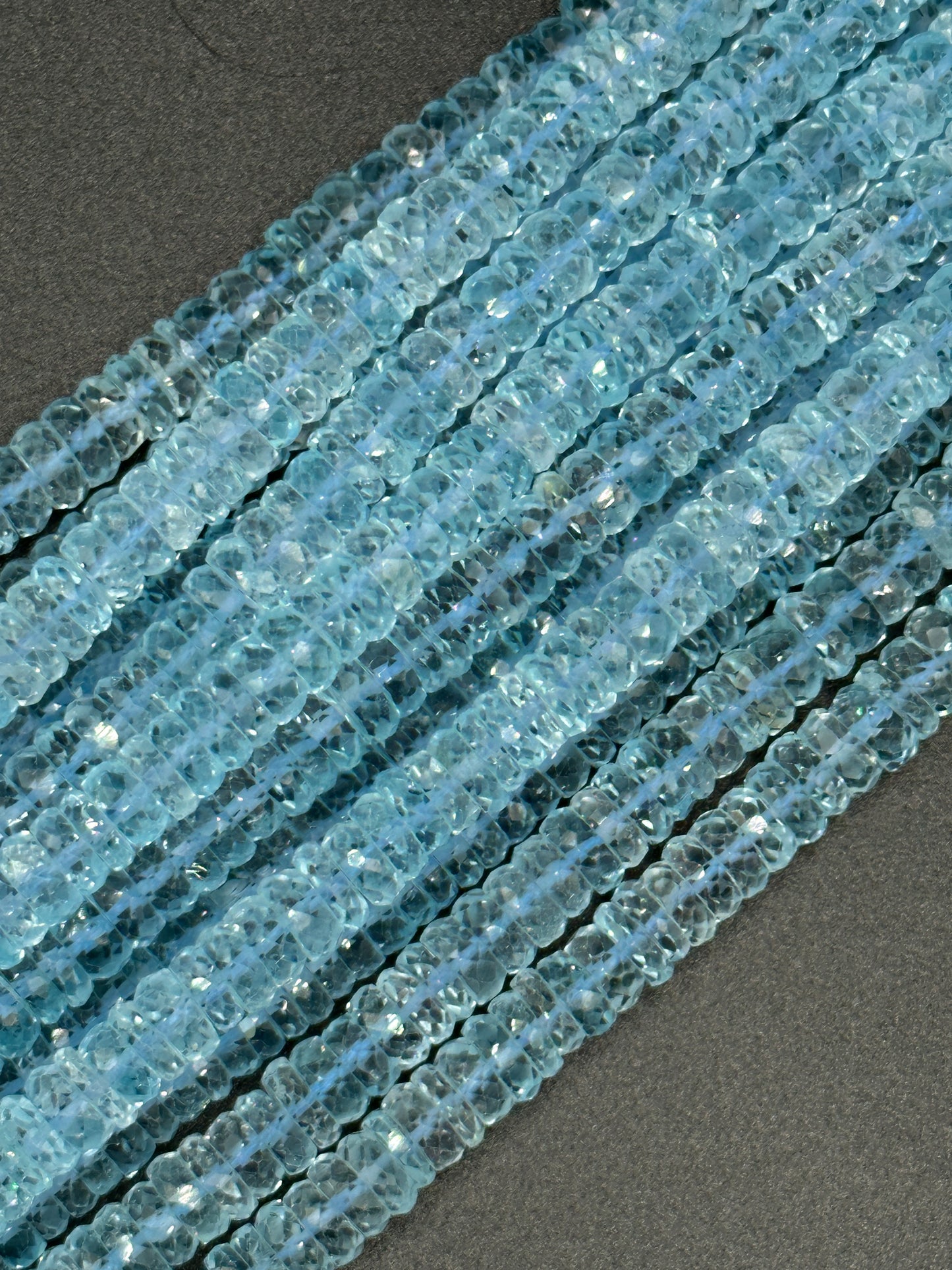 Blue Topaz faceted disc