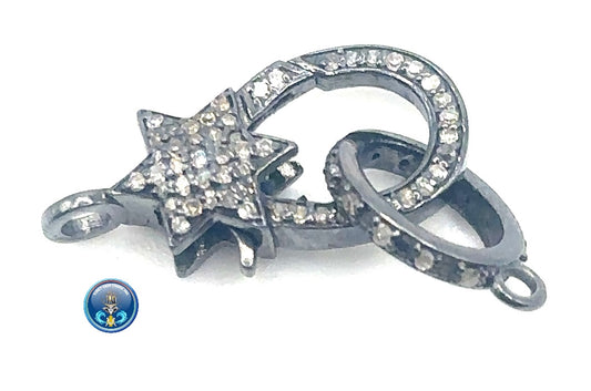 Pave diamond with rhodium plated over sterling silver clasp