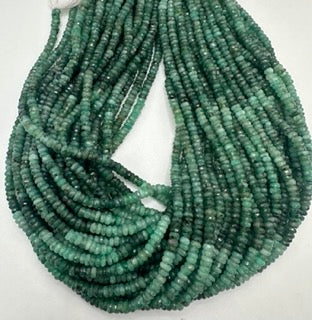 Emerald facetted roundel