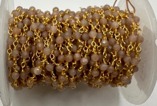 Peach moonstone facetted round 3mm 14k gold plated wire wrapping chain sell by 25 feet