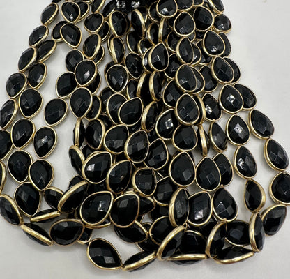 Black spinel facetted pear