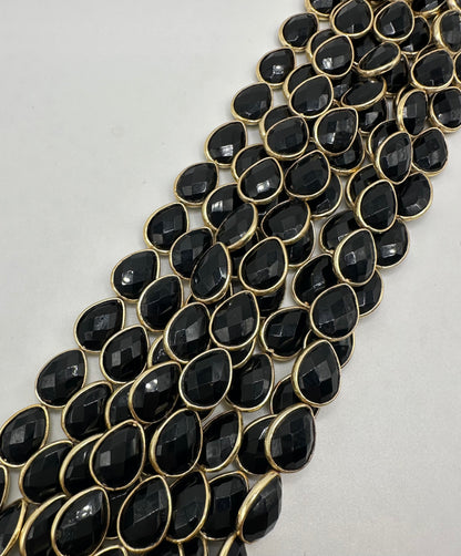 Black spinel facetted pear