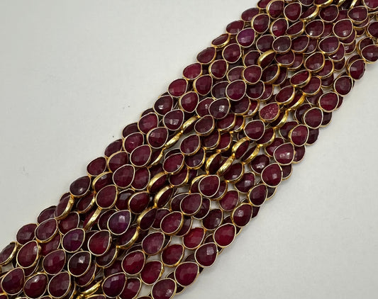 Ruby facetted pear 7x9mm bezel