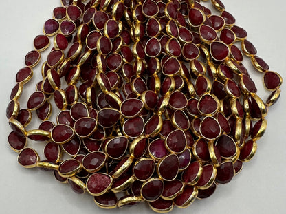 Ruby facetted pear 7x9mm bezel