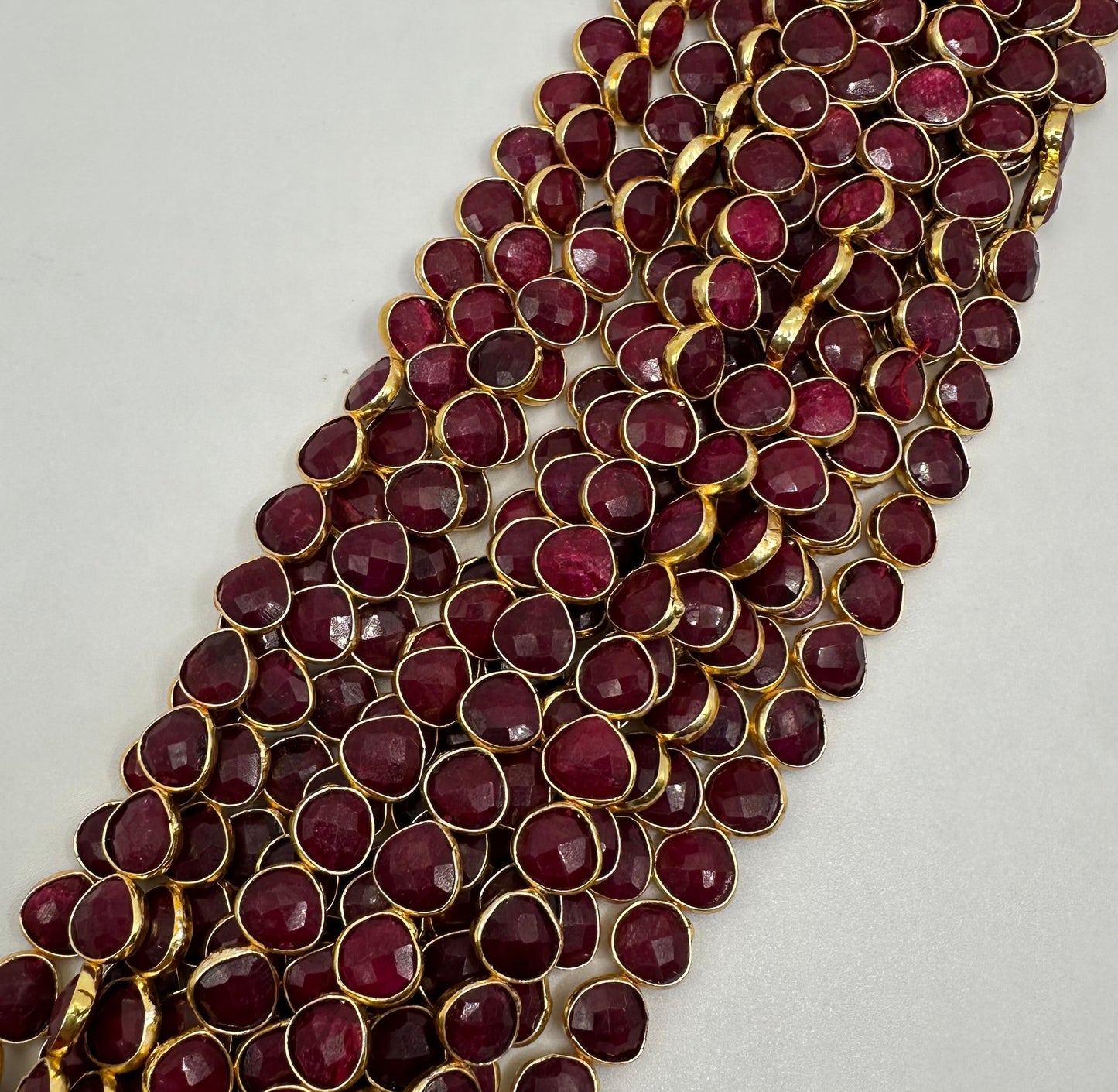 Ruby facetted heart 7mm bezel.