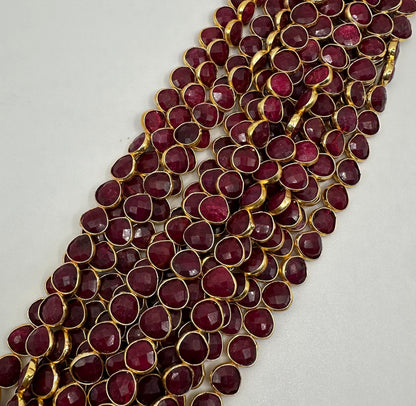 Ruby facetted heart 7mm bezel.