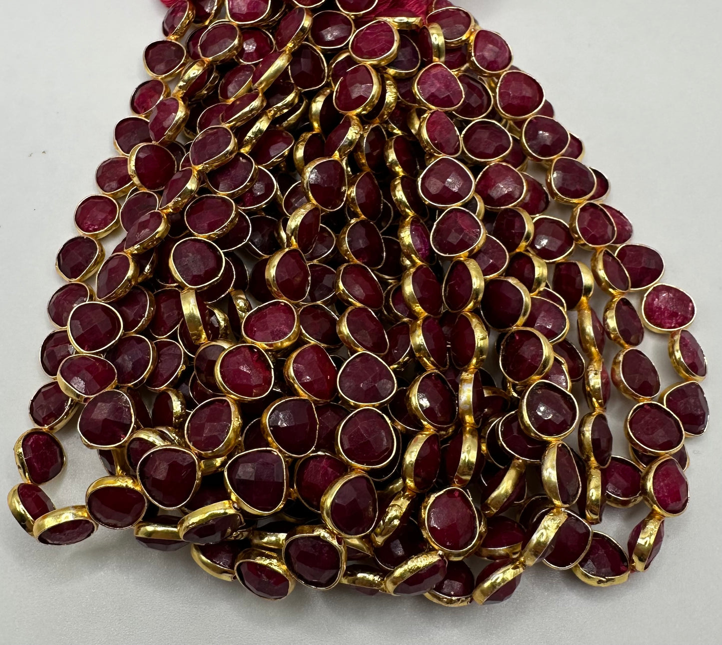 Ruby facetted heart 7mm bezel.